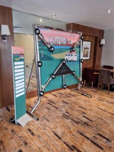 Batak pro with branded leaderboard and backdrop