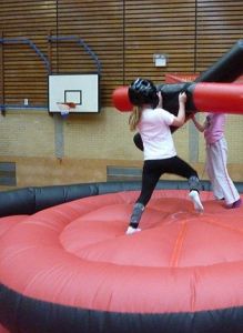 Players on the gladiator joust