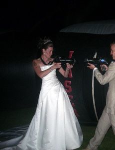 Bride & Groom playing laser tag