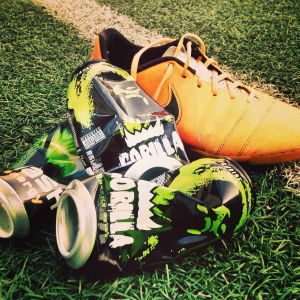 Gorilla cans with football shoe