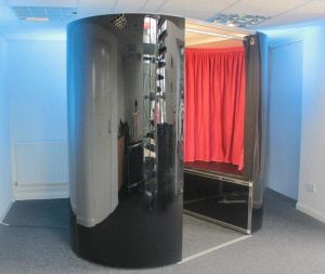 Black style photo booth set up to be hired at an event