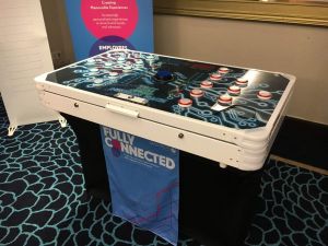 Neuron Race reaction game complete with branding table runner
