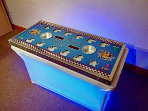 Pluck A Duck steady hand game set up with an LED table for an event.