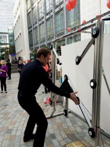 Olympian, James Cracknell playing on a Batak Reaction Wall at a corporate event.