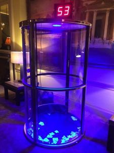 Grab a grand machine set up at an evening event complete with LED lighting.