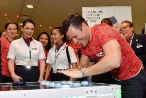 Mark Wright, from TOWIE playing on a Neuron Race reaction game.