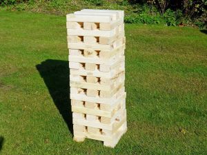 Thumbnail of a giant jenga game consisting of wooden blocks to create the high tower.