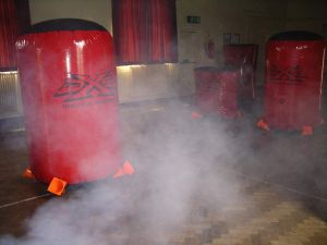 Inflatable objects to create an Indoor Laser Tag game complete with smoke and lighting effects
