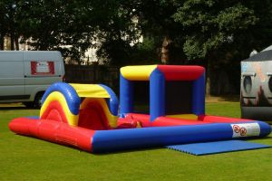 Inflatable Playzone complete with ball pond, slide and bouncy castle.