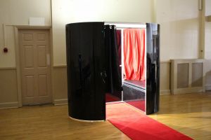 Black coloured photo booth set up for an event