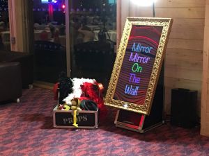 A Magic selfie mirror and prop box ready for hire at an event