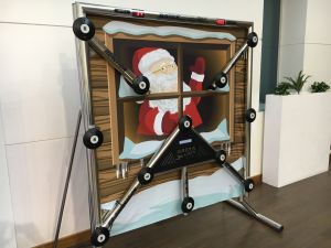 Batak Reaction Wall with Christmas themed backdrop with Santa waving