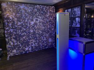 Blue LED Selfie Pod at an Event with glittery backdrop