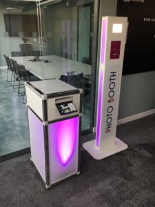 Selfie Pod and the Printing Station both with pink lighting