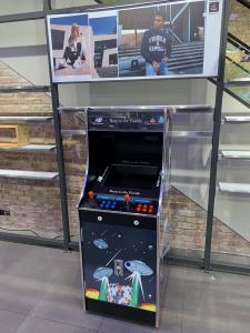 Arcade Machine with branded panels and screen