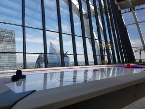 Purple LED Air Hockey Table with the view of London