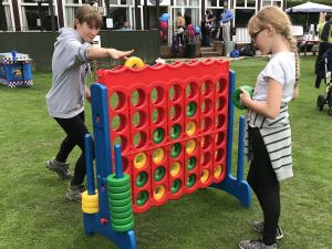 Ladies Playing Giant Connect 4