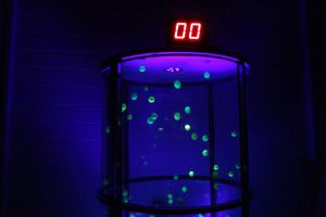 UV Grabber Game with Yellow Balls