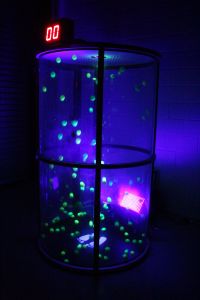 UV Grabber Game with Yellow Balls