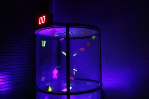UV Cash Grabber with multicoloured neon paper