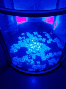 Money in UV cash grabber machine