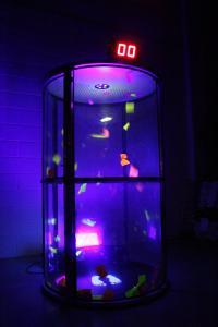 UV Cash Grabber with multicoloured tokens