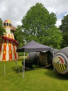 Inflatable Laser Tag set up next to a slide
