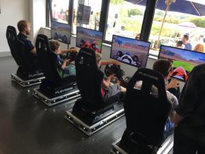 Four Players on the Racing Simulators