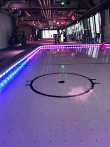 air hockey table with added LED lighting in venue