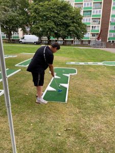player testing golf