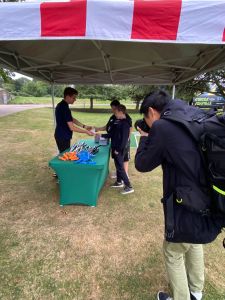 golf clubs, golf balls and score sheets